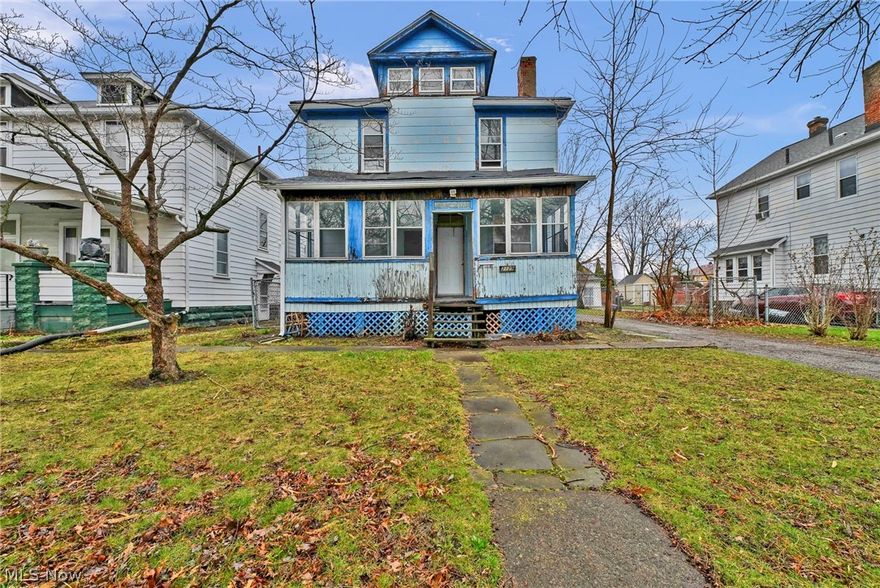 Welcome to this beautifully maintained Colonial-style two-story home offering 4 bedrooms, 2 full bathrooms, a spacious backyard with a deck ideal for entertaining, a detached two-car garage, and a charming covered front porch that enhances its timeless curb appeal. With classic character, built-in features throughout, a seller-provided APHW home warranty, and inviting indoor and outdoor living spaces, this home is truly a standout.

Step inside to a warm and welcoming living room centered around a decorative fireplace with a stunning brick accent backdrop, creating a cozy yet refined focal point. Carpeted living areas provide comfort, while the kitchen features durable vinyl flooring and a bright eat-in breakfast nook—perfect for everyday living. A formal dining room adds a touch of elegance, complete with beautiful built-in drawers and shelving that offer both charm and functionality.

Upstairs and down, you’ll find two full bathrooms thoughtfully positioned for convenience, with an additional laundry area located in the basement to maximize efficiency. The range, refrigerator, and dryer are all included, making this home even more move-in ready.

Step outside and enjoy the expansive backyard and deck—perfect for hosting gatherings, relaxing evenings, or simply enjoying your own private outdoor space. The detached two-car garage provides ample room for parking and storage.

Homes with this much space, character, and value don’t come along often—schedule your private showing today and experience everything this exceptional property has to offer.