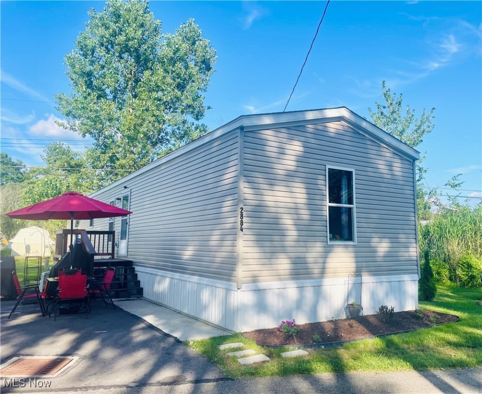 Discover your dream home in the heart of Southington's vibrant leased-land community! This immaculate 3-bedroom split ranch mobile home is nestled in a picturesque country setting, surrounded by mature trees and lush shade. The expansive, beautifully landscaped yard is a true standout, featuring a private fenced dog park for your furry friends, a family-friendly playground, and a charming pavilion perfect for gatherings.
Step inside to an inviting open-concept layout, seamlessly connecting the living room, dining area, and modern kitchen. The thoughtfully designed split ranch floor plan places the master suite on one side for ultimate privacy, complete with a spacious walk-in closet and a luxurious ensuite with a walk-in shower. The two additional bedrooms are conveniently located on the opposite end, ideal for family, guests, or a home office. A dedicated laundry area near the master suite adds practicality, while durable linoleum flooring flows throughout, blending style and easy maintenance.
Outside, enjoy a large shed for storage, a relaxing patio, and newly planted trees that enhance the property's curb appeal. This affordable gem comes with transferable warranties and flexible lending options, making homeownership within reach. Park approval is required for the next owner.
Don't miss this opportunity to own a stunning home in a welcoming community! Contact the listing agent today to schedule a tour and explore this Southington treasure.