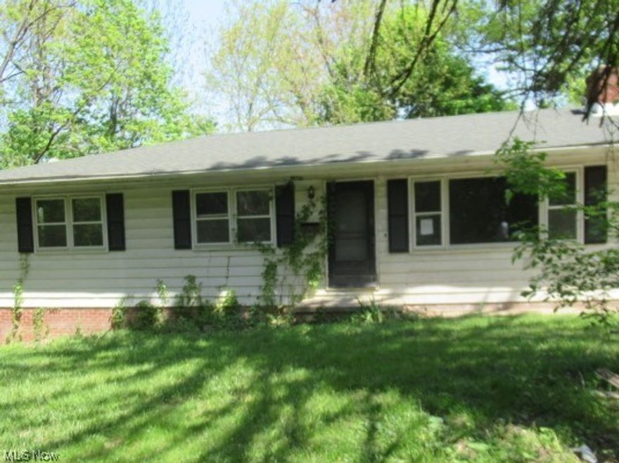 Ranch Design situated on Double Wooded Parcels on a quiet Dead End Street! Great Views of Nature from every window! This home features a Full Walk-Out Basement with Second Kitchen, Family Room, Plenty of Storage, Laundry, and Additional Bath. One Car Attached Garage. This is a great opportunity for an Investment or Handy Owner Occupant! Bring your remodeling plans, this home has so much to offer and endless potential for rehabbing with all your preferred  design finish work and decorating ideas. The homes interior finish is basically original from 1965 and will definitely be a project! This is a very rare find located within the City! Convenient to Freeways, Metro Bus Lines, Shopping, Parks, and other Amenities with a Wonderful Country Feel! Agents see BROKER REMARKS for placing your offers - The property is to be Sold AS-IS. Total acreage and taxes include both parcels.