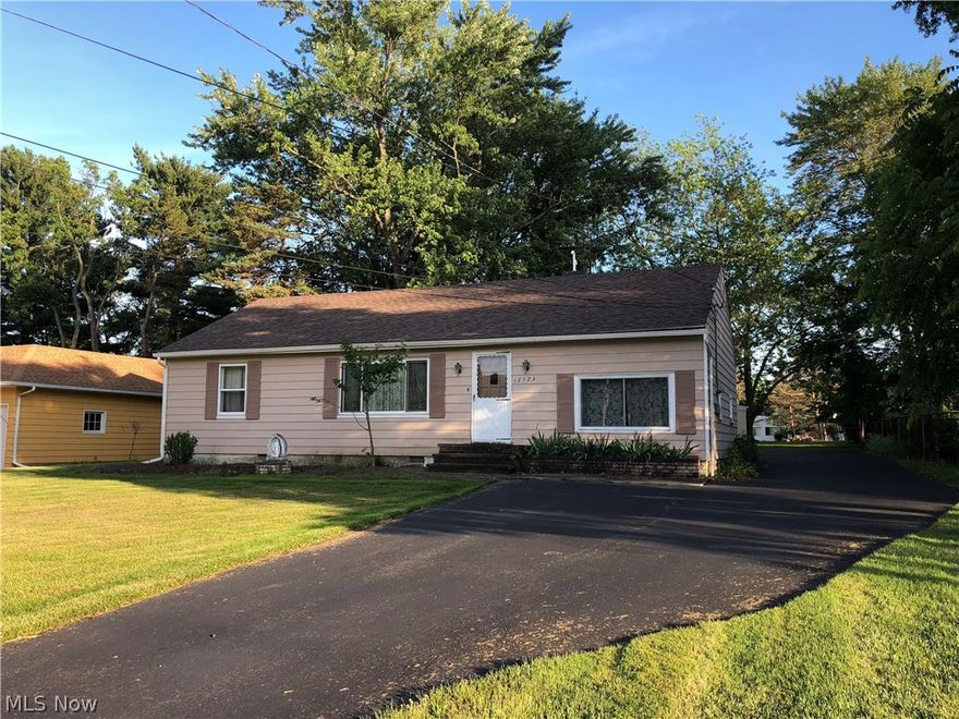 Great Opportunity! Live in North Royalton at such an Affordable Price! This Home is situated on Almost 1 Acre! The Lot is Gorgeous!! Set Back off the road with Loads of Curb Appeal! There is a Covered Patio to Enjoy the Beautiful Back Yard. 3 Car Garage!! and Sale Includes a New Riding Lawn Mower, Snow Blower, and Lawn Equipment! Updates Include: New Roof 2017 - New Driveway 2014 - New Furnace 2016 - C/A Less than 10 Years - Hot Water Tank 2015!! Full Attic Space to Help with Storage with Blown-in Insulation. The attached Garage was Converted and Finished with a Closet. This could be a 3rd Bedroom, Office, Computer Room. This Home Is a Great Value in an Award Winning School System! Move in and Make it Your Own!!