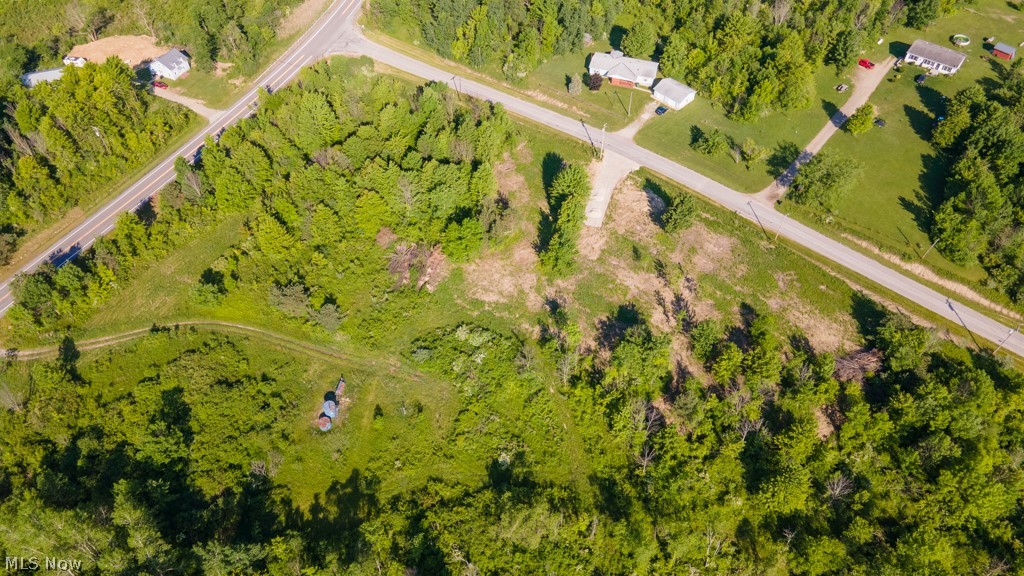Take advantage of this rare opportunity to own 37.5 acres with 0.6 miles of frontage on 2 roads (route 84 and Fox Rd), beautiful woods that are perfect for hunting, hiking and building your very own dream home in Buckeye schools! Close to everything Ashtabula County has to offer- covered bridges, wineries, Lake Erie, apple orchards, etc. Very close proximity to i90. Survey just completed.