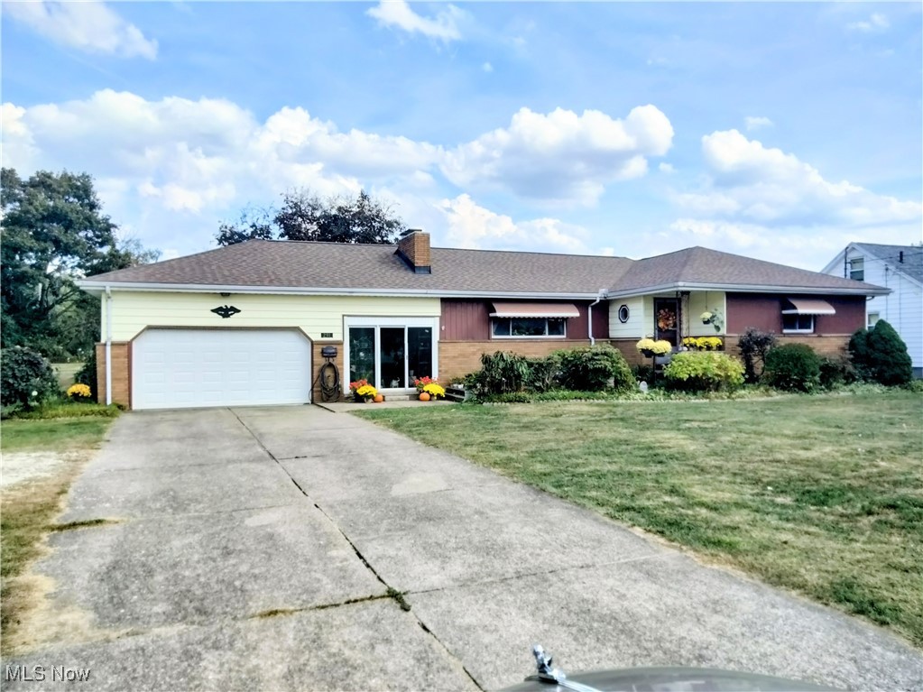 Welcome to your dream home, you have finally found this sprawling ranch you were looking for. This is a one owner home, first time on the market since it was built. Motivated seller will look at all offers.Very well maintained and totally remodeled in the past 3 years. This brick, vinyl & cedar, maintenance-free home, has spacious Master bedroom, 2 large bedrooms, 2 full baths, full basement, chain link fenced in & gated backyard, a dog kennel, a private concrete patio, shade trees on a large half acre corner lot, measuring 115'x175'. Long double wide, concrete drive with gravel turnaround. Quality built, hip-roof construction, newer roof dimensional shingles & vinyl windows. The first-floor 26 Ft.long Family Rm. has two sets of triple wide, full wall sliding doors onto the private concrete patio. Newer oak kitchen cabinets, two pantries a Lazy Susan, upscale Stainless steel appliances, Ceramic subway tile backsplash, stainless steel dishwasher & disposal. Dinette with garden window. Foyer with octagon window, room divider stone planter. hardwood beneath, laminate flooring throughout, one bedroom has new carpet, newly remodeled baths. Wrap around hallway with a clothes chute. Huge full basement sports a brick log burning fireplace, large open space ready to convert to a rec.rm./man cave, and the pool table will stay. The laundry area has 2 washers & 2 dryers, has wash tub. A second kitchen, a fruit cellar/workshop a newly installed furnace. Central air, newer Chain-link fenced in deep backyard it is gated, has a dog pen and patio, great for children & pets, a beautiful Gazebo with seating. This home is ready for new buyer. Start making your new memories here today! This is a nice quiet sidewalk community next door to a Church, near shopping, enjoy beautiful Roosevelt Park, the newer school & newer library complex. Close to downtown, on bus line to Youngstown State University, Pennsylvania line & freeway access. Minutes of Mill Creek Park, and Malls.