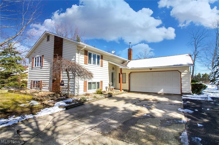 Your forever home awaits you in beautiful Perry on a Cul-de-sac! This 4 Bedroom, 2 Full-Bath Bi-level has the WOW factor that today’s home buyers are looking for in a property! The open floor plan with neutral colors is inviting and sprawling. The beautifully updated Eat-in-Kitchen boasts modern elegance with Custom Cabinetry, large Pantry, Stainless Appliances, beautiful Quartz Counters, ceramic flooring and back-splash. Entertain your guests in the formal Dining Room then bring the party out into the vast and rustic Sun Room with Vaulted Ceilings and Skylights.   The main floor also holds the Master Bedroom, an additional Bedroom and an updated Full Bath with marble counter-top.  Come downstairs to enjoy the cozy Family Room and Fireplace with wood burning insert!  On the same level, you will find the Laundry Room, and two additional Bedrooms or use one as an Office!   The lower level features an amazing Entertainment Room with Bar, truly a perfect gathering place for friends.  Come outside to enjoy the half-acre lot with inviting Deck and giant Swimming Pool!  Updates include New Windows 2014, New Furnace/Aprilaire in 2017, 30-Foot-Round Heated Pool with Deck New in 2013!  Sellers are generously offering a One Year Home Warranty!  Come make this unbelievable home yours before it is gone!