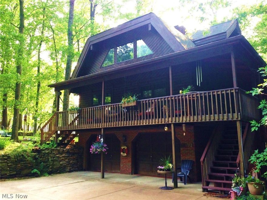 Spectacular log home surrounded by wildlife on five wooded lots at Lake Buckhorn. This house was framed using heavy post & beam construction, solid white cedar log walls, and multiple covered porches. Two story great room with tongue and groove ceilings, beautiful brick fireplace and leaded glass windows. Dream kitchen with an abundance of natural light, granite counter tops, stainless steel appliances, apron sink and plenty of storage. There is one bedroom and one full bath on each of three stories making it ideal for family and guests. Finished walk out basement, large laundry room, two car garage, fantastic shop/barn, and a brick path leading to the screened gazebo. Breathtaking waterfall view!! For more information regarding, fees, rules, restrictions, amenities, activities, calendar, etc. please visit lakebuckhorn.info
