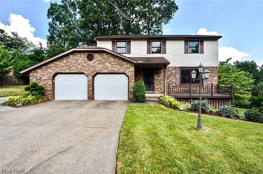 Welcome to 6244 Youngdale-Upon entering the front door, you'll find a meticulously maintained Colonial offering 4 bedrooms, 2-1/2 baths that sits on a beautiful over half acre lot situated on a cul-de-sac in Jackson Township! This home  has a country feel right in the heart of Jackson that offers peace and privacy in a very tranquil setting. You'll love the 3 tiered wrap around deck for entertaining and the beautifully landscaped waterfall that adds to the serenity. This home offers a great open floor plan just waiting for your personal touches! Upstairs, you'll find 3 nicely sized bedrooms and full bath as well as the large Master Suite with walk-in closet and full bath. Enjoy your morning coffee sitting on your personal Master Balcony overlooking an open field where you're sure to see wildlife. There's an additional 300+ square feet that the rec room offers in the finished walk-out lower level. There's also an attached oversized two car garage and an additional paved pad for your rec