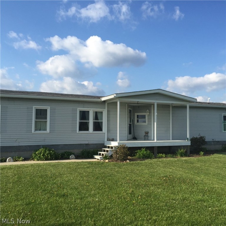 Great lot to build your dream home, can see for miles, level and cleared. Presently '84 2BR-2BA with over sized 2C garage on property. Septic system and well already there. So many possibilities! US 30 convenient for commuters. Here's the place to put your "forever home"
