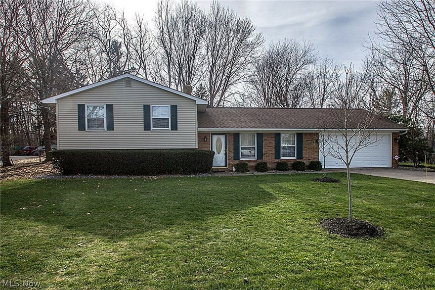 Loads of updates in this newly remodeled split level. Just moments away from historical downtown Painesville. With three bedrooms and two full, updated bathrooms this home has the opportunity to be your perfect family home, or great for downsizing. Entertain in the freshly upgraded kitchen with updated appliances, tile, and countertops that flows perfectly into the living and dining room. All rooms are freshly painted with new carpet. The finished basement offers the perfect family room or man-cave space, equipped with laundry room with washer and dryer, new hot water tank, and more. Minutes from the park, golf course, and more!  Walking distance to the High School.