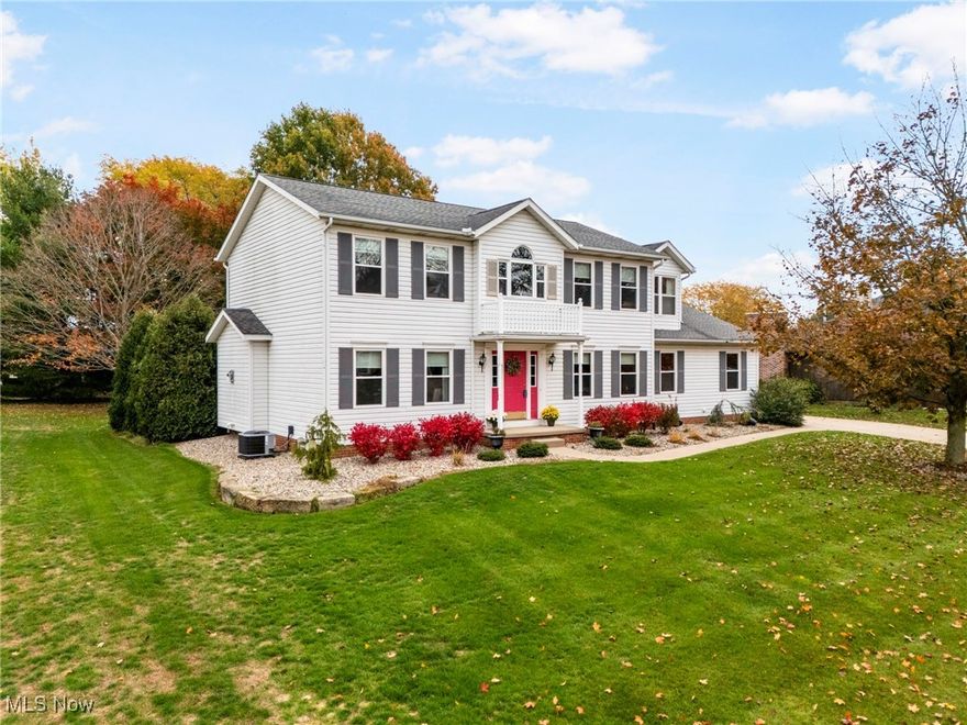 Welcome to this beautifully updated 4-bedroom, 2.5-bath Colonial offering 2,242 sq. ft. of living space and a 3-car attached garage. The heart of the home is the bright, open kitchen featuring granite countertops, a custom island, and plenty of storage. It flows seamlessly into the spacious family room, where a marble-surround gas fireplace adds warmth and character. From here, step through sliding doors to a stunning outdoor retreat—featuring a brand-new deck (2023) with a covered roof (2024) and an extended patio designed for entertaining or relaxing all year long. Upstairs, the primary suite is a peaceful escape with an impressive new walk-in shower and generous closet space. Every detail has been refreshed, including new flooring, completely remodeled bathrooms, new windows (2024) with stylish coverings, and a brand-new furnace and A/C (2025). Flexible laundry hookups are available on both the main level and in the basement for your convenience. Outside, enjoy a fully fenced backyard with professional landscaping and a newly seeded lawn—perfect for gatherings, play, or quiet evenings under the stars. The property also offers scenic lake views and access to HOA amenities such as fishing, canoeing, and picnic areas. Located in the desirable Lake School District, this meticulously maintained home offers the perfect blend of comfort, quality, and community living. Simply move in and start making memories!