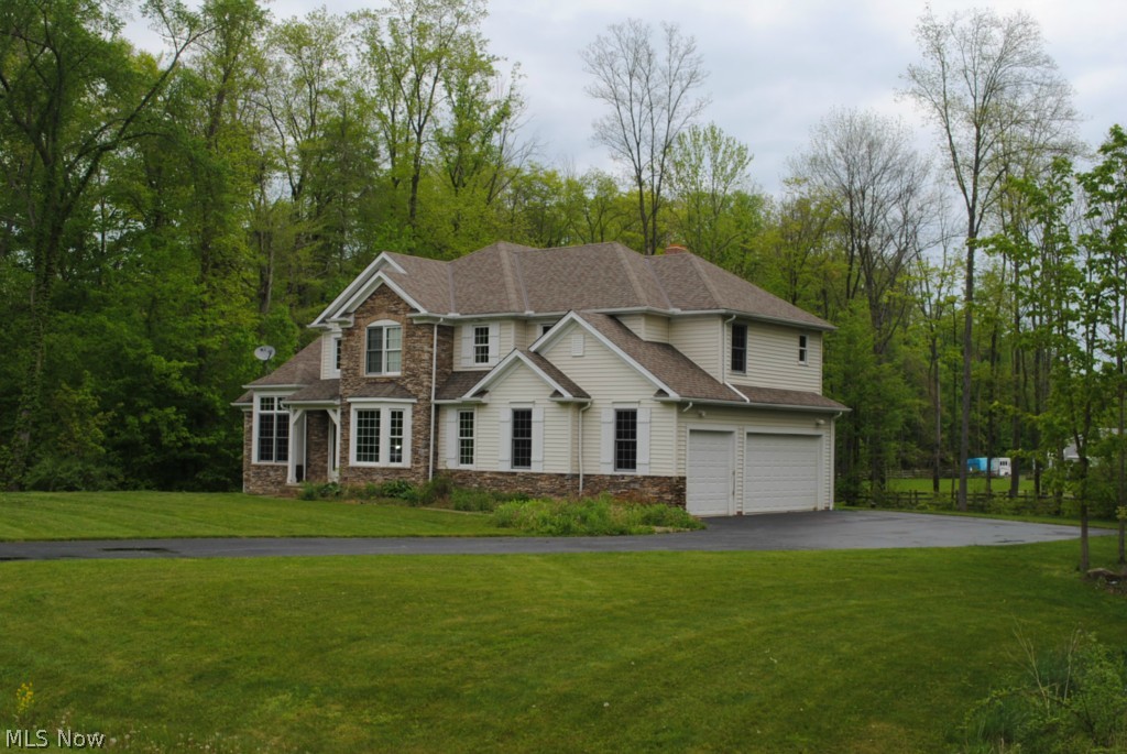 BANK OWNED .... Impressive Colonial On Secluded Wooded Culdesac .... 1.5 Acres .... 4 Bedrooms, 3.5 Baths .... Master Suite .... Large 2 Story Great Room With Floor To Ceiling Windows With A Woodburner .... Eat-In Kitchen With Center Island .... Family Room With Cozy Fireplace .... 1st Floor Office .... 1st Floor Laundry Room .... Large Basement ..... 3 Car Side Load Garage ....