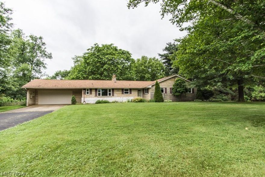 Live In The Historic Village Of Zoar! This Hidden Gem Offers So Much Privacy & Water Views On 2.42 Acres w/Plenty Of Nature To Relax & Enjoy! Tucked Back In With A Spacious Beautiful Front Yard. A Stone Brick Ranch Home That Includes 2,332 Sq Ft Of Living Space Welcomes You Into Foyer That Overlooks Living Room w/Big Picture Window & Two Sided Fireplace Opens To The Dining Room. Enclosed Sunroom w/Spectacular Wooded/Water Views To RelaxAnd Enjoy Peace & Quiet. The Applianced Kitchen Offers Plenty Of Cabinet Space & Dinette w/Picture Window For Enjoying Your Morning Coffee. Large Pantry or Storage Closet. Master Bedroom w/Private Access To The Full Bathroom. Sizeable Second & Third Bedrooms w/Jack N Jill Full Bathroom. Full Finished Lower Level Includes Rec Room And Family Room w/Fireplace. Full Bathroom. Laundry Area. Plenty Of Storage Space. Basement Also Has 1 Car Back Load Garage With Walk Out Access. Plus You Have A 2 Car Attached Garage. The Home Will Have Free Gas As Long As Avai