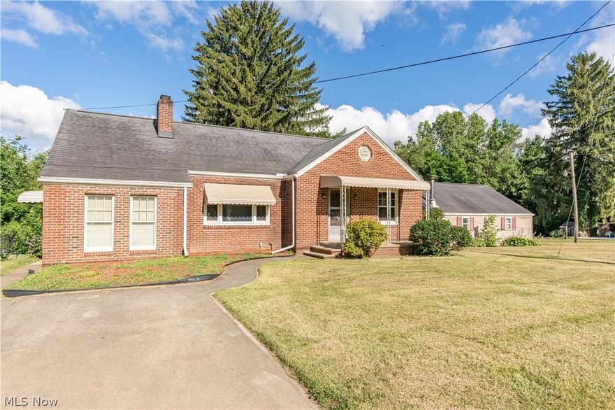 Rare opportunity located directly on the towpath adjacent to the Tuscarawas River. This distinctive property features a two-bedroom, one-bath home with a detached two-car garage, as well as a separate 900 square foot commercial building zoned I1.