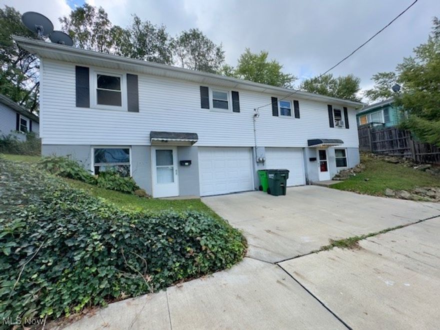Great opportunity for an owner occupied investment or to add to your existing portfolio. Unit 322 has been renovated and unit 320 is currently occupied with a month-to-month tenant. Both units feature a main floor with 2 bedrooms, 1 bath, kitchen, and spacious living room with doors leading to a large backyard. The lower level offers a bonus room,utility/laundry room, and access to the attached garage. Come take a look!