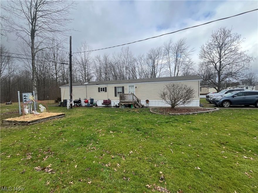 Welcome to Southington Estates! A desirable Mobile home community nestled in the country setting of Southington Ohio. Here you will find a welcoming community that is pet friendly and easy to maintain! This is a cozy single wide home with a nice layout, 3 bedrooms with 2 full baths. With new installed interior doors, and a gorgeous back splash in the kitchen, this home has a ton of charm! A few of the windows are brand new, the roof is 1 year old, with 30yr shingle warranty. The hot water tank is 3 years old. It also has a storage shed in the back for all your lawn equipment!