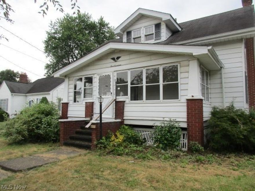 Great opportunity!  This home offers 3 bedrooms, full bath, enclosed front porch, beautiful natural woodwork.  Garage has finished area, enclosed entrance from garage to house.