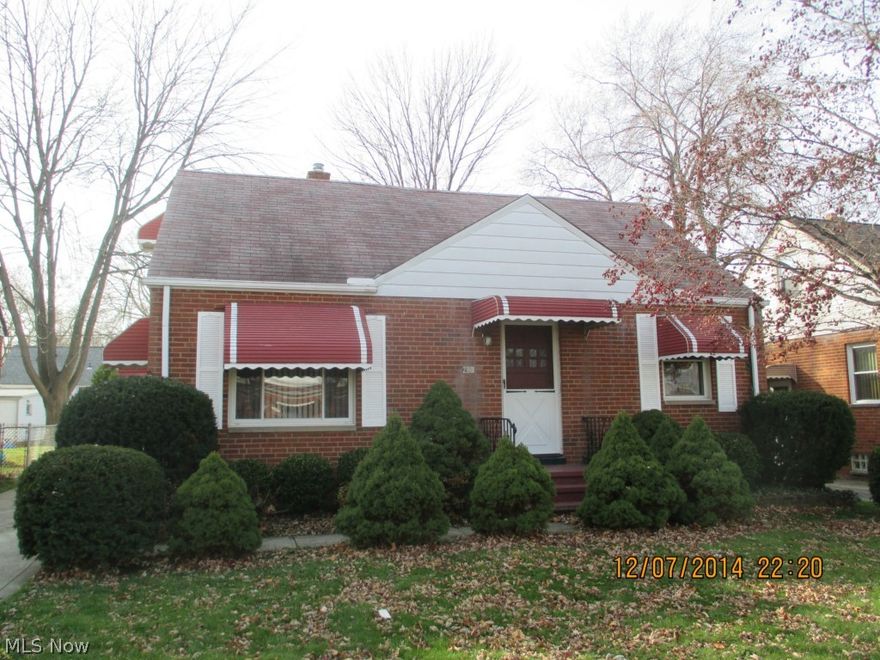 Well-maintained brick bungalow with new carpeting throughout.  Violation FREE!   Eat-in-kitchen features wall oven and countertop range plus dishwasher.  Hardwood floors on first and second levels.  Large bedroom on second floor featuring knotty pine ceiling and paneling plus built-in drawers.  Finished Rec Room in basement with newer carpet and full second bathroom. New electrical and GFIs.   Other amenities include 2 car detached garage, covered patio and central air.  Close to the shores of Lake Erie, shopping, schools and easy access to freeways.