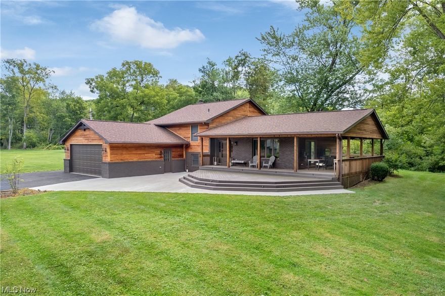 Waterfront home on Atwood Lake with tons of upgrades, a private dock, and gorgeous views! The main floor features an open great room with a gourmet kitchen, living room, dining area, and access to the huge wrap-around porch. The second story has a private master suite with an updated bathroom, walk-in closet, and private balcony, two additional bedrooms, and a full bathroom. The lower level features a large family room with a fireplace, full bathroom, and laundry room/mudroom off the two-car attached garage. The basement is partially finished with a game room/rec room and utility/storage closet. Properties like this are one-of-a-kind and don't come available often!