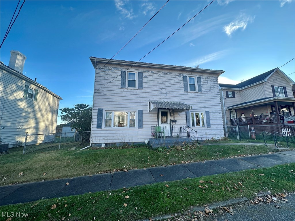 Charming 2-Story Rental Home with Great Potential. This solid 3-bedroom, 2-bathroom home has been a reliable
rental property for years and offers a wealth of potential for the right buyer. Currently rented month-to-month for $600, it
features a large, detached 2-car block garage, perfect for storage or additional parking. Key updates include a newer
metal roof and a brand-new AC unit, ensuring peace of mind for years to come. The home also boasts a forced air gas
furnace for efficient heating. With its solid foundation, spacious layout, and recent improvements, this home is a fantastic
investment opportunity or a perfect space for an owner-occupant looking to build equity. Chain link fenced yard ! 3rd
bedroom is a captured room.