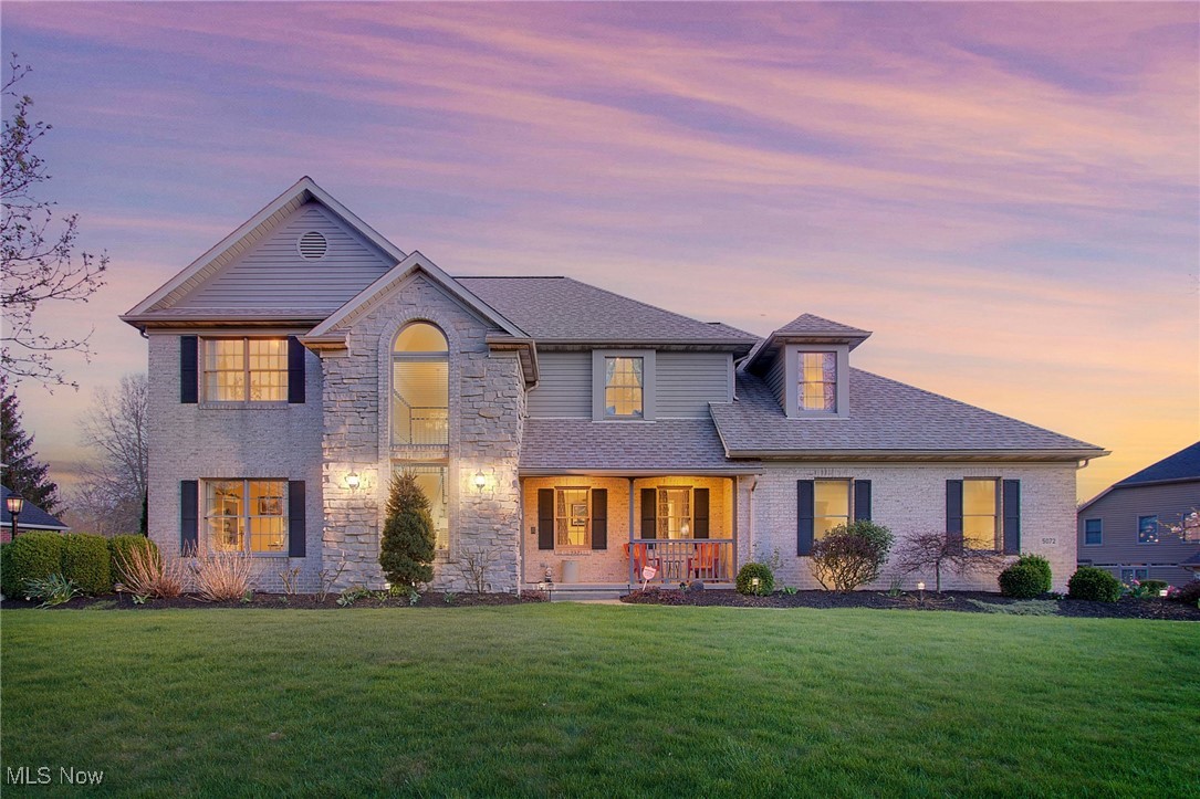 Capture the beautiful view of Glenmoor Country Club Golf Course right from your own backyard with frontage perfectly located on the 15th hole of this Jack Nicklaus Signature Golf Course. The beautiful brick and stone is timeless but the 100K landcape/hardscape designed backyard make this home absolutely stunning to view! Entering the front door is a gorgeous staircase flanked on either side by a coiffered ceiling dining room and light filled office. Progressing through the great room ahead are Palladian windows with great views of the golf course. A stately gas fireplace adorns the room. The attached kitchen includes an open breakfast area with coffee station where you can catch the occasional deer and ducks on the pond or just watch golfers at the end of the 14th hole and tee off on the 15th. The Trex deck right outside the kitchen has built in lighting. Beautiful granite countertops, glazed white cabinetry and stainless steel appliances and a pantry are just some of the finishes in the kitchen! Between the kitchen and 3 car garage is a mudroom entry, laundry room and half bathroom. On the opposite end is the primary suite with another glass door to it's own deck for more great views! The bathtub tiled shower, water closet and double vanity complete the primary bathroom which has storage galore. The four upstairs bedrooms include a large bonus room/bedroom, two rooms joined by a Jack & Jill bathroom, and a fourth bedroom. There is a second bathroom upstairs as well. Plenty of room for everyone! The lower level walk out is again facing the golf course, and has multiple uses with a fully applianced kitchen, full bathroom, fireplace, multiple sitting areas, exercise room and whatever else you may desire. It can easily be an in-law suite and was used as such. Through the dining area door is the nature stone underdecking covered patio bordered by a pretty retaining wall. Not only is the golf course beautiful but so is the landscaping, water features and so much more.