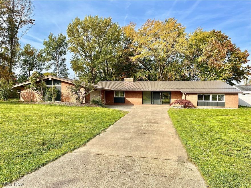 What a wonderful and total transformation this 2500+ sq foot brick ranch has undergone! You're sure to love the open floor plan with new vinyl flooring plus restored wood floors, spacious kitchen with all new cabinetry, granite tops, huge walk-in pantry and 1st floor laundry hook up. The vaulted ceilings in the L-shaped living room add character to the space while the fireplace and gorgeous views of the one of a kind patio area will definitely exceed expectations. The master suite offers a full bath, walk-in closet and private entrance to the backyard and patio (did someone say HOT TUB ?? :) the H-U-G-E full basement could easily be finished to add additional living space, but as is offers a workbench area, loads of additional storage spaces, a 2nd laundry area and a new forced air furnace with AC and updated electric panel. 2.5 car garage, new metal roof, concrete drive and newly tied in City Sewers! All set on a nearly 1/2 acre lot in the Meadowood Allotment with E-Z access to Rte 45 and I-90.