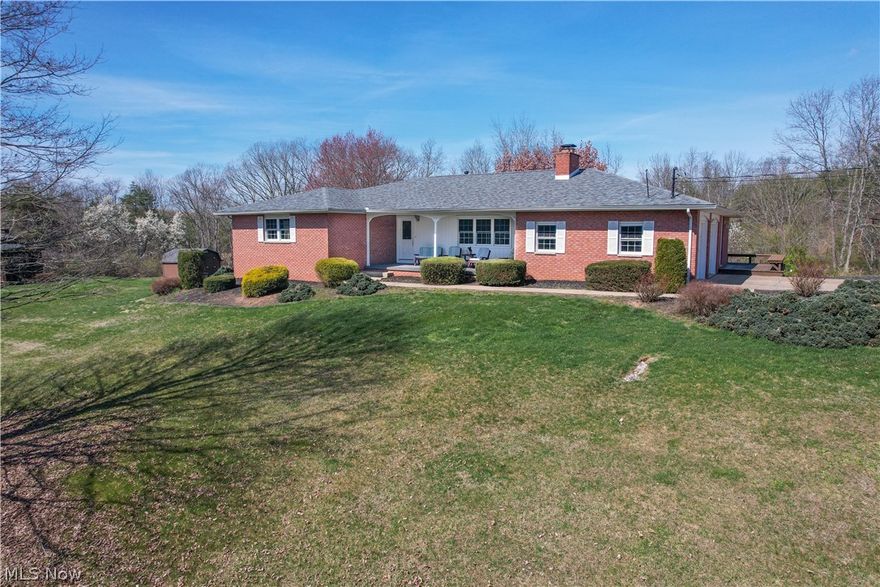 Welcome to this charming brick ranch home nestled on 3 acres of picturesque land, offering tranquility and breathtaking views from atop a gentle hill. This idyllic property features 3 spacious bedrooms and 2.5 baths, providing ample space for comfortable living. As you enter, you'll be greeted by a warm and inviting atmosphere, with a dining room perfect for family gatherings and a well-appointed eat-in kitchen that is both functional and stylish. The large rooms throughout the home provide plenty of space for relaxation and entertainment. The partially finished basement adds versatility to the home, offering additional living space and featuring an extra kitchen, ideal for hosting guests or creating a separate living area. Step outside onto the screen porch or gazebo and soak in the serene surroundings, enjoying the sights and sounds of nature. The 2-car garage provides convenient parking and storage space. Situated in a tranquil country setting, this home offers a peaceful retreat while still being within reach of modern conveniences. It's a perfect blend of comfort, elegance, and natural beauty, making it a truly desirable place to call home.