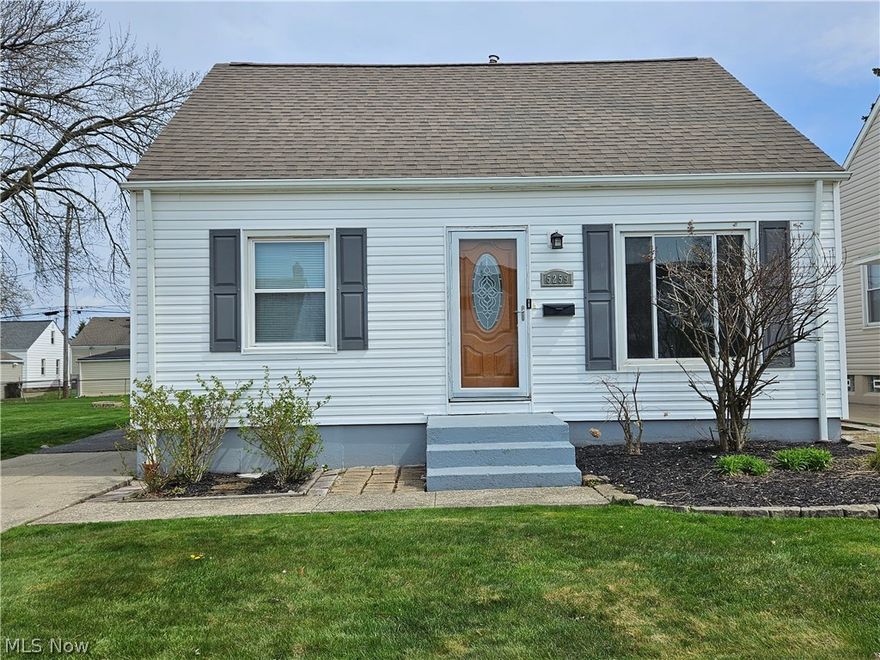 CHARMING THREE BEDROOM CAPE COD STYLE HOME SITUATED ON AN EXTRA 20' WIDE LOT!  FRESHLY PAINTED INTERIOR.  NEWER FRONT DOOR ENTRANCE.  SPACIOUS LIVING ROOM WITH HARDWOOD FLOORS.  RECENTLY UPDATED EAT-IN KITCHEN FEATURES BEAUTIFUL WOOD CABINETS, TILED BACKSPLASH, NEW COUNTER TOP, DOUBLE STAINLESS SINK, GAS STOVE, MICROWAVE AND REFRIGERATOR.  NEW BATHROOM TILE AND VANITY (APRIL-2024)! SPACIOUS AND OPEN 2ND FLOOR BEDROOM WITH LARGE WALK-IN CLOSET PLUS ADD?L ATTIC STORAGE.  EXPAND YOUR LIVING SPACE IN THE LOWER LEVEL FINISHED RECREATION ROOM.  GLASS BLOCK WINDOWS. WASHER/DRYER STAY. ENJOY THE OUTDOORS ON YOUR BRICK STONE PATIO. GREAT LOCATION WITH EASY HIGHWAY ACCESS.  MAKE THIS HOME YOURS TODAY!!!