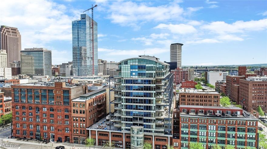 Seldom available lease opportunity at Pinnacle. The heart of the Warehouse District and all the comforts of a full-service luxury condominium. Large, open floor plan that's as perfect for everyday living as it is for a party. Full walls of floor to ceiling windows with lake views and the peaks of the twinkling skyline at night. Large kitchen with granite counters, stainless appliances, and a big island with a breakfast bar. The master suite has an extra-large walk-in closet and a beautiful bath with double sinks and a roomy shower with glass doors. The second bedroom generously sized, making it perfect as a bedroom, an office, or both, and has its own full bath with a tub. There's an elegant powder room off the entry hall. A large laundry/utility room gives you the convenience of a full-sized washer and dryer and a laundry sink, and also provides some extra storage room. And one of the best places of all is the balcony, where you feel the shoreline and the Stadium - and the skyline - like they're right across the street. And they are! 24-hour concierge, a full gym, sauna, and a beautiful rooftop garden complete the amenities. One garage parking space (a prime space, directly across from the elevator) is included. Multi-year lease also available.