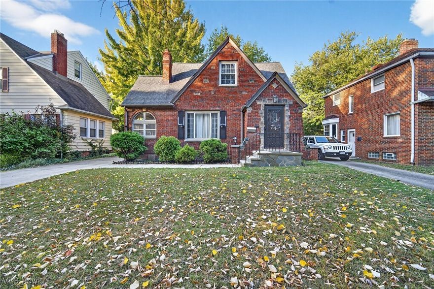 Experience timeless elegance and lakefront living at 74 E 214th St. This distinctive 4-bedroom, 3 full-bath Cape Cod offers a full bath on each level, a spacious eat-in kitchen, formal dining room with built-ins, inviting fireplace, and a sun porch with sliding doors—perfect for relaxing or entertaining. The finished, waterproofed lower level adds versatility with space for a bedroom, office, and recreation room, plus abundant storage. Enjoy a 2-car garage and a well-kept yard in a sought-after location north of Lakeshore Blvd.

Residents enjoy the rare privilege of Edgecliff Club membership, providing exclusive access to a private beach along Lake Erie—a lifestyle few can claim.

Come experience the charm, comfort, and prestige this home has to offer.