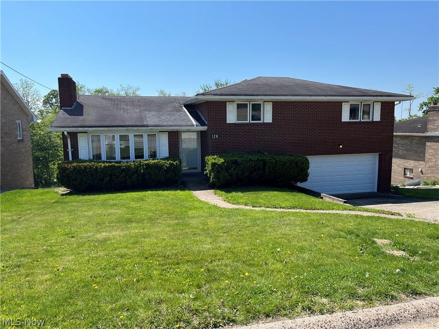 Updated 3 bedroom, 2 full bath, 1 half bath, brick, split level home in nice residential neighborhood in the village of Wintersville.    Finished room on lower level could be a 4th bedroom.  Finished rec room on lower level also.  Walk out basement to rear yard which is partially fenced.  Owner is having a new metal roof installed.