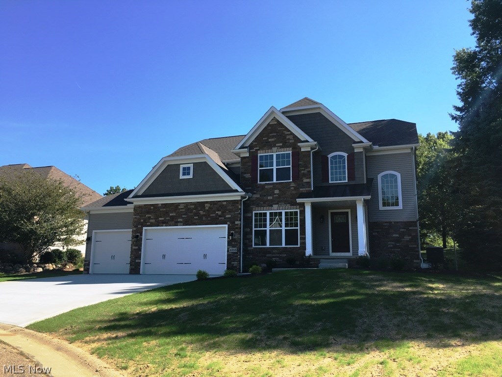 This is a wonderful find in Jackson Township. This new construction offers 3 car garage, 9ft ceilings on the first floor with an open living concept. The amazing kitchen features our signature hearth room/keeping room with fireplace and living space for entertaining. With over 2500 sq ft of living space with 2 fireplaces, 4 bedrooms, 3 full and one half bath, full egress in the basement, Hardwood throughout foyer, study,kitchen,dinette and keeping room. The cabinetry will feature a beautiful white painted glazed finish with oil rubbed bronze fixtures. All the finishing touches will complete this amazing new floor plan. Relax and enjoy the views of the neighborhood pond and park that offer a delighful walking path for members of the community. Loads of bells and whistles at a price that is unbelievable. Call for additional details or a complete list of amenities.