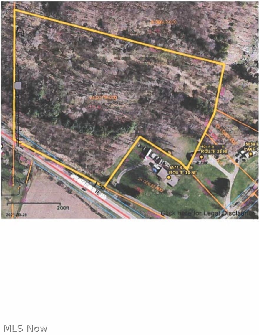 7.7 acres along State route 39, wooded, will sell with mineral rights.