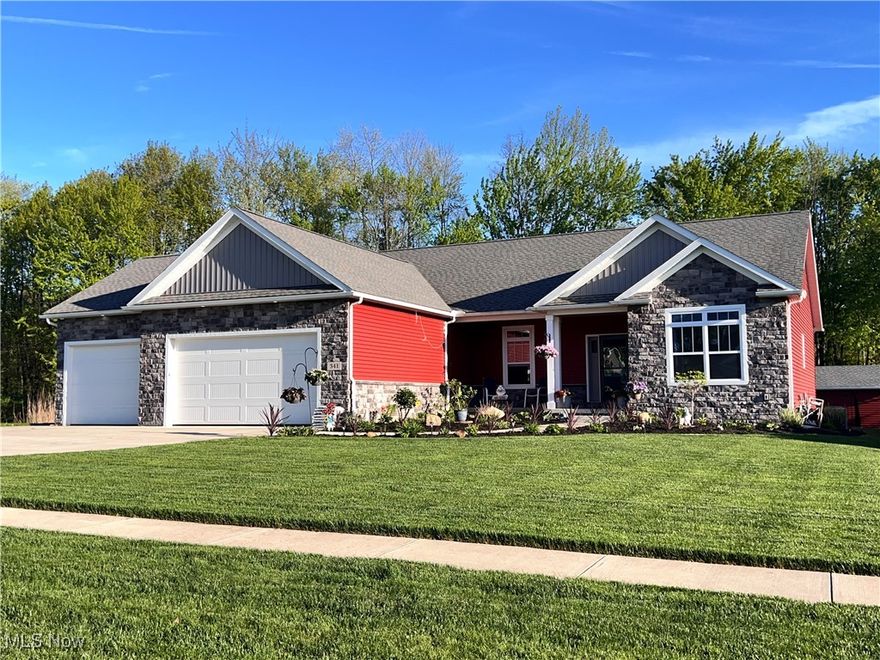 Step into comfort and style with this beautiful Stone enhanced exterior, recently landscaped Ranch home. Completed in 2020, this newer build features a bright open floor plan, with all the amenities of one floor living. The  over sized 3+ car garage is insulated and has a gas hookup for heat if desired. Upgrades incude a direct drive Liftmaster garage door openers,and sink with hot and cold water. The driveway provides ample concrete parking for vehicles.
 A fenced in backyard with two level patio, 12x16 Gazebo, Additional natural gas hookup for grilling or fire pit. A custom built 12x12 shed was added by owners, built to match the home. Features doors on both ends for convenient access. This home was updated at build with many extra features, such as premium cabinets, Solid core doors throughout. Custom ceiling panels in kitchen and main bedroom. first floor office/computer area with convenient half bath nearby.   Other additions include 8ft garage doors, and Transom window in garage.  4 ft. wide front sidewalk to door. All ADA compliant doorways. Gas and Electric to washer and dryer. Laundry room is oversized with sink.  The basement rec room features laminate flooring, painted walls and ceiling and ample storage.  It also includes a fully finished bathroom with shower.