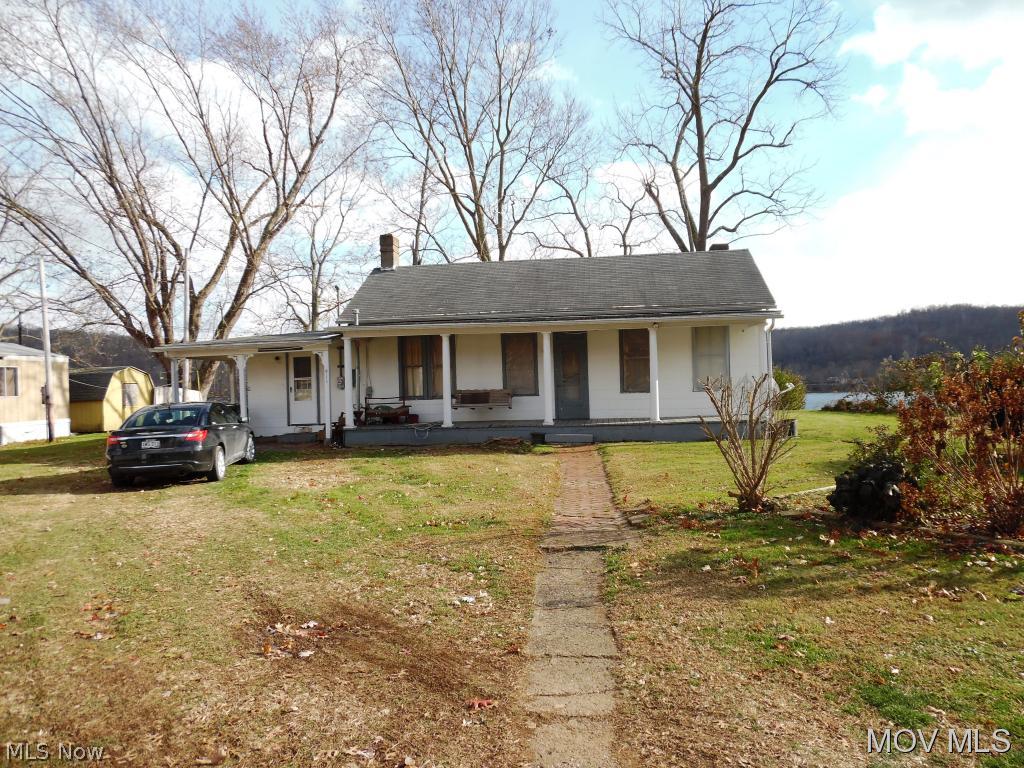 Older home in need of extensive remodeling. Beautiful river front lot! Room sizes are approximate. MREI #5179 Elem: New Matamoras Elem/Bus: Y JrHigh: Frontier Middle JrHigh/Bus: Y High: Frontier High School High/Bus: Y Fire: VOL Police: SHF PossFreeGas: N ;SQFT=Fin L1:1055, Fin Bsmt:0, Fin Above:1055, Fin Total:1055, Unfin Bsmt:800, Unfin Above:800;PRKG= Off Street