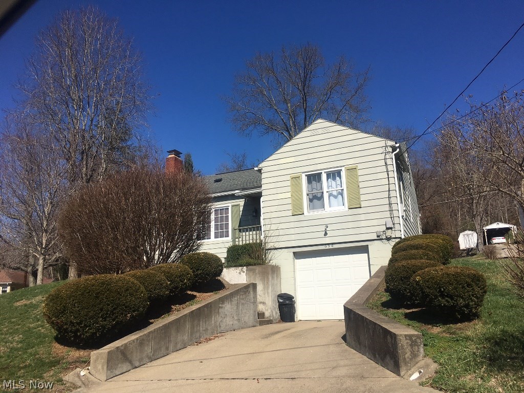 Beautiful Ranch Home featuring a large living room with fireplace, three bedrooms. 1.5 baths, formal dining room, nice kitchen with appliances opening onto covered patio. Home has updated bath, corner lot with paved driveway, 1 car attached garage. Nicely landscaped!