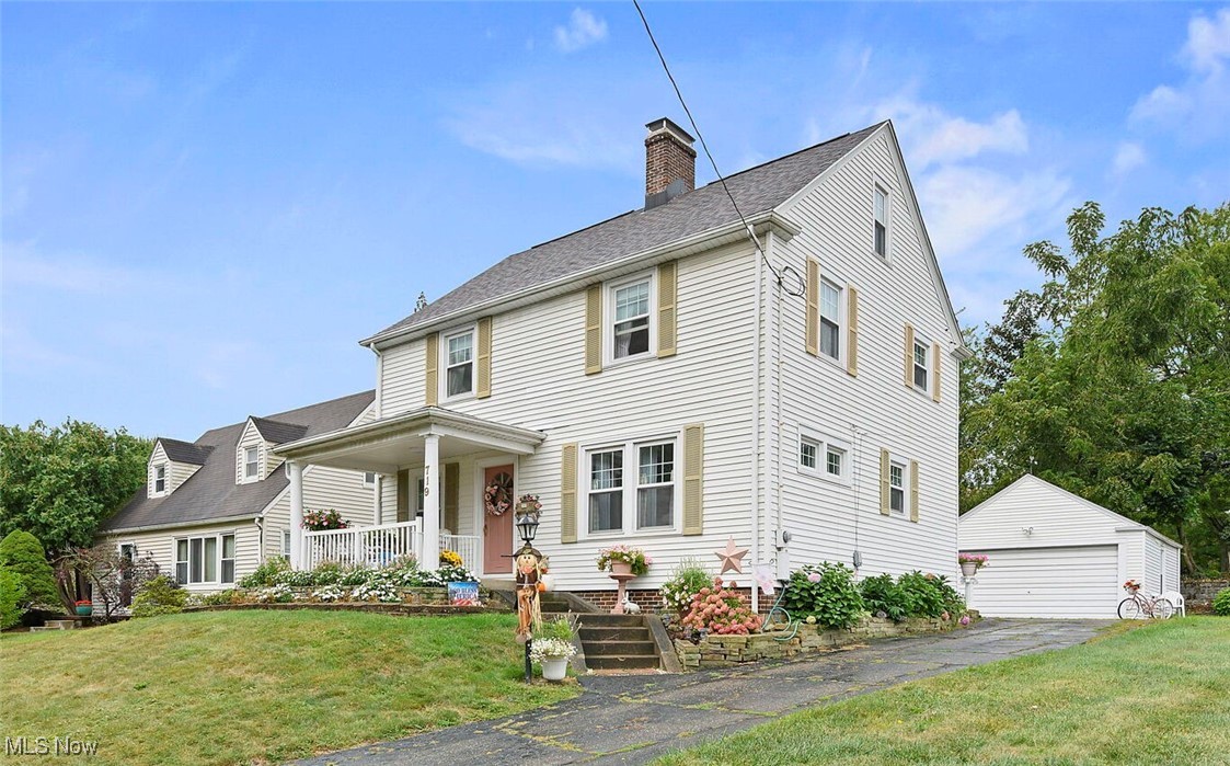 Step into the charm of this classic Federalist-style home, filled with character and timeless appeal. The covered front porch and covered rear porch, both surrounded by flowers, provide peaceful and inviting outdoor living space. Inside, beautiful hardwood floors are complemented by architectural period features including built-ins, crown molding, and rounded archways. The main floor consists of a sunlight-filled spacious living room with a fireplace, a formal dining room, a kitchen with ample cabinet space, and an extra large half bathroom. A beautiful French door and large second-floor landing await at the top of the staircase, leading to a full bathroom and three bedrooms. There are hardwood floors under the upstairs carpet, ready to be revealed! You will never run out of storage space with the walk-up attic, accessible with a pull-down rope and folding ladder. The basement is partially finished, featuring an elegant marble fireplace, bar area, and even more storage space under the stairs. An extra storage room, laundry area, and utility area complete the basement, which is also already plumbed for an additional bathroom, should you choose to add one! With undeniable curb appeal and a 5 year old roof already in place, this house offers peace of mind and solid value. Conveniently located near shopping, restaurants, entertainment, and several parks- ideal for nature lovers! While some cosmetic updates are needed, the potential is clear and reflected in the attractive price, giving you the opportunity to personalize this distinctive home!