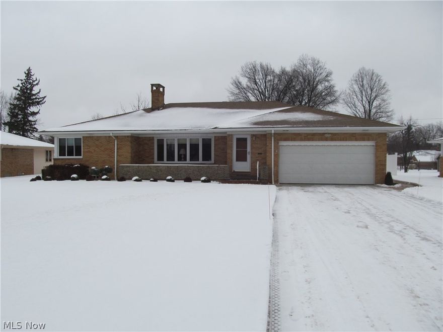 Be first or be sorry!  Pride of ownership!  3 bedroom, 1 1/2 bath brick ranch. Features an eat in kitchen and formal dining room with built in china cabinet and large living room.  Nice sun room off of the dining room.  Beautiful hardwood floors.  Recreation room with big laundry room and big bonus room with loads of storage and updated glass block windows.  Features a covered porch in the front and stamped concrete patio in the back.  Includes 1 year HMS Home Warranty!