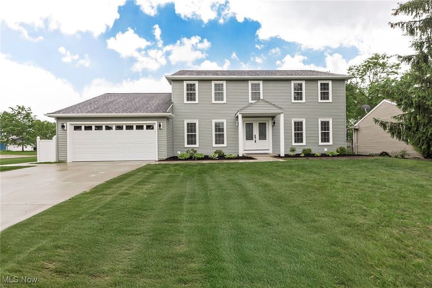 Spectacular Colonial in Spyglass Hill Development! Shows like a Model Home! Welcome to this warm and inviting 4-bedroom, 3-1/2 bath Transitional Home!  Attractive Bamboo wood flooring on first floor with shimmering white cut-stone electric fireplace in oversized family room! Exceptional kitchen with aLL new stainless steel appliances, Quartz countertops, all white cabinetry! Simply stunning! Huge Laundry Room on first with state of the art washer and dryer! Owners suite with deluxe bath as well as 3 generous sized bedrooms! Beautifully renovated bathrooms! Finished Lower level club room with Full bath. 2 car attached garage plus a single garage off the Laundry Room; ideal for Boat storage or work-out area; very versatile home! New roof, siding, windows, A/C and new front garage door and driveway. A beautiful development in the heart of Strongsville with amenities including an outdoor pool, clubhouse, tennis courts plus access to shopping, dining, and recreation! Just minutes to Cleveland Hopkins Airport, and approximately 25 minutes to downtown Cleveland. Truly a special home with much attention to detail. Call for your private showing!