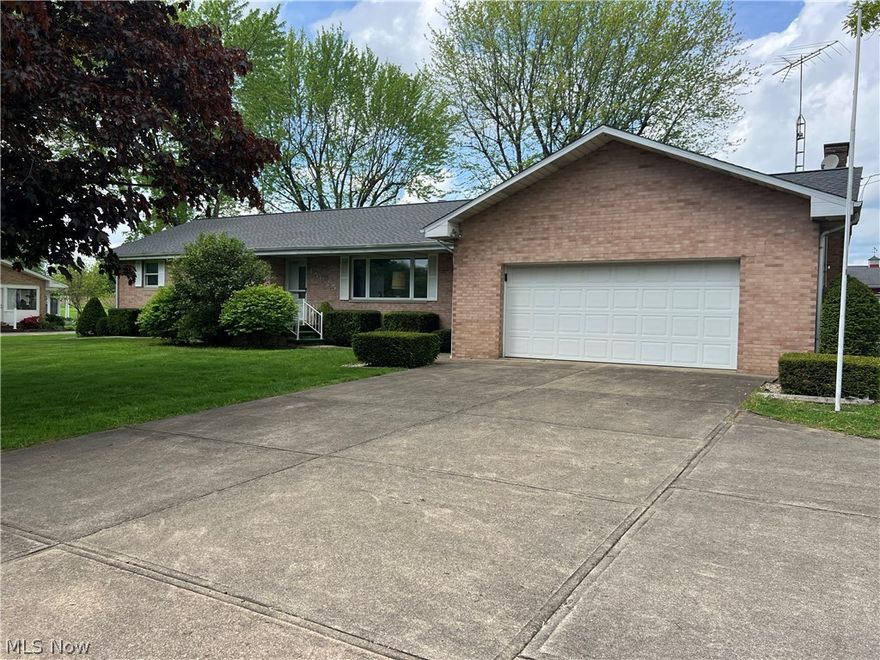 Country living at its best with a custom built one owner brick ranch on .85 acres in Marlington Schools. 2-car heated garage with hot and cold water, attic storage and large closet space. New roof Nov. 23, newer furnace & air conditioner. Basement has entrance to outside with double metal coverings over steps. Some glass block windows. Large crawl space under family rom with heat available. Basement has shower & sink & lots of built in shelving.
