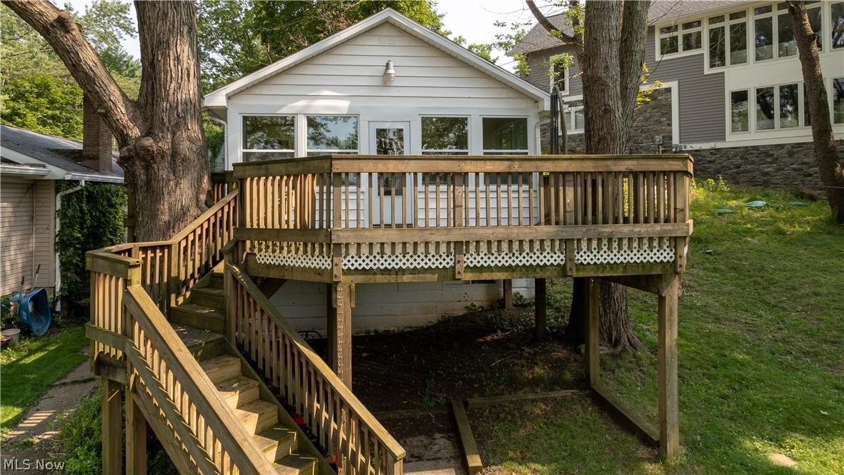 If you're looking for a lake house with incredible views for an affordable price, look no further. Located in the Willowdale Lake Community this property is on Oak Dr which is on the lake with a dock just across Oak Dr with lake privileges. It is close to major restaurants, Akron Canton airport, and highway but nestled in tranquil surroundings. This could be a second home for the weekend or enjoy the friendly atmosphere full time. With only about a twenty minute drive to Akron and one hour drive to Cleveland it is very accessible. This ranch style home has three bedrooms and one bath all on one level and the lower level can also be finished for even more space. New windows were just installed and electrical has been recently updated as well. There is a clubhouse and a beach across the way to mingle with others in the community with many bands and entertainment as well as various functions throughout the year. Make an appointment and come see a truly different way to live. Call your fav