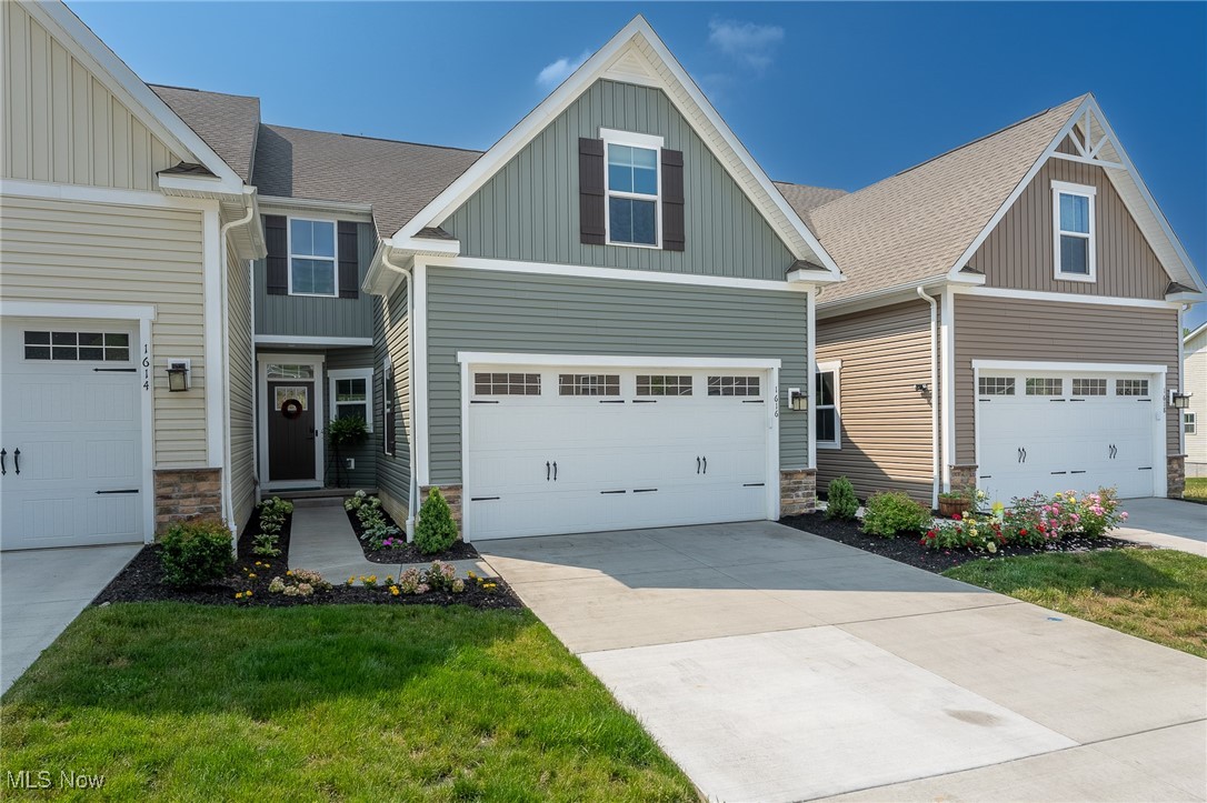 This stunning villa townhome in the Villages of Sycamore offers the perfect blend of comfort and convenience in a picturesque, park-like setting. Move-in ready, this home boasts a charming partial stone façade and a spacious two-car garage. Inside, the kitchen shines with elegant white cabinetry, quartz countertops, stainless steel appliances, and luxury vinyl plank flooring that extends into the sunroom. A cozy breakfast bar and an open dining area overlooking the great room make it perfect for entertaining. The bright and airy sunroom offers breathtaking views of the scenic surroundings. The main-level owner’s suite features a double vanity and an upgraded shower with a built-in seat. For added convenience, the laundry room is also located on the main floor. Upstairs, you’ll find two generous bedrooms, a shared full bath, and an oversized hall closet for extra storage. One of the home’s standout features is the beautifully finished walk-out basement, complete with a full bathroom and additional storage space. Don’t miss this opportunity to own a stylish, well-appointed townhome! Call today for your private showing before this one is SOLD!