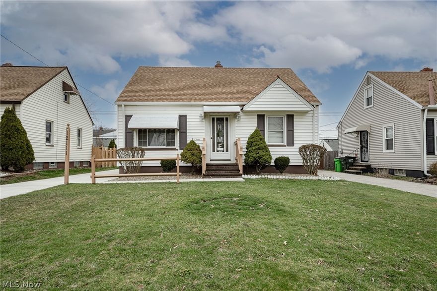 Move right into this charming cape cod in Garfield Heights! This well-maintained home features over 1400 square feet of finished living space with 3 bedrooms, 1.5 bathrooms, spacious living areas, and several recent updates! The front door opens into a the large, bright living room that features hardwood floors. Head back the the kitchen where you will find plenty of natural light, a cozy eat-in area, and crisp white appliances. There are two bedrooms on the first floor and a well-kept full bathroom. Upstairs, there is a very large third bedroom that spans the whole width of the home. The lower level includes a very spacious rec room, a half bathroom, a storage area, and a laundry area with a newer washer and dryer. Additional recent updates include a newer electrical panel and water tank and new central AC in 2020. Outside, there are well-kept garden beds, a lovely back patio, and a back yard that would only need a gate to be fully fenced in. Located just off of Turney Rd, just minute