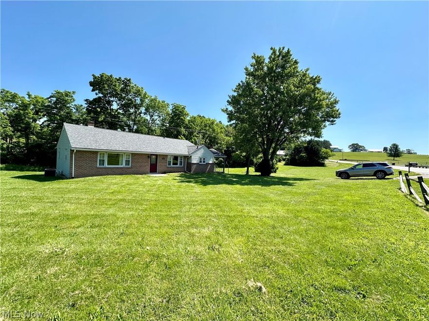 Charming brick ranch with abundance of space on a sprawling lot. This home welcomes you into to an oversized living room boasting tons of natural light. From there you are taken into the dining room with built in cupboard that opens to the large kitchen featuring newer cabinets and counters. Off the kitchen is a large covered patio perfect for out door entertaining. Also, off the kitchen is a first floor laundry room with access to the bedroom hall. The first floor also features three generous sized bedrooms with large closets. Two bedrooms share a jack and Jill bathroom. There is also a half bath on the main level. The basement now a blank space perfect to let your imagination run, it also has a two car garage.