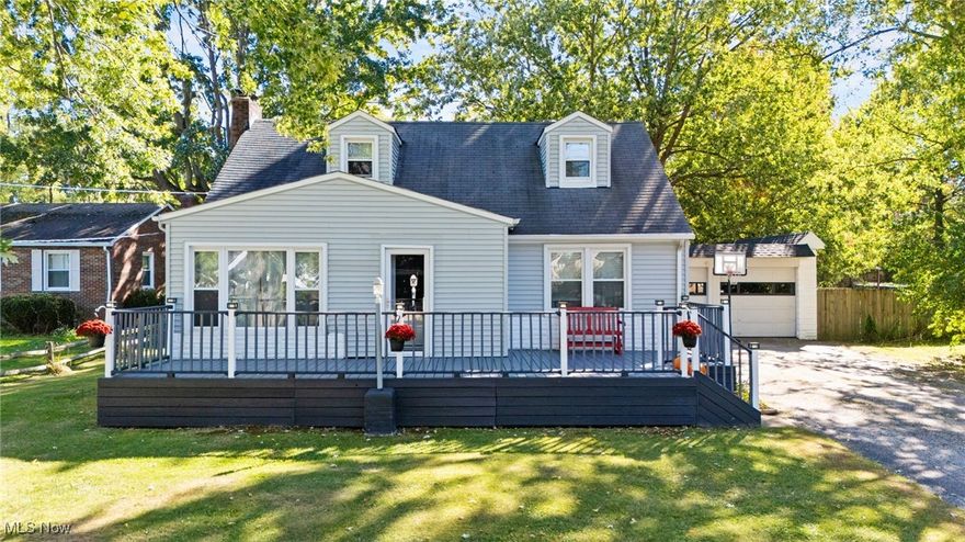 Welcome home to this charming 4-bedroom, 2-full-bath bungalow nestled on a large, private lot at the end of a quiet dead-end street in Painesville Township. Enjoy peaceful outdoor living on the spacious front deck, offering plenty of room for seating and relaxation. Step inside through the breezeway or mudroom into a light and bright living room that flows nicely into the roomy kitchen, featuring ample counter space and a cozy breakfast nook. The main level includes two comfortable bedrooms and a beautifully renovated full bath. Upstairs, you'll find two additional bedrooms providing extra space for family, guests, or a home office. Off the dining area, a large rear deck overlooks the fully fenced, private backyard - perfect for entertaining, play, or pets. The oversized detached garage offers excellent storage and workspace potential for hobbyists or anyone needing extra room. The lower level adds even more versatility with a large rec room featuring ceramic tile flooring, a full bath, a generous laundry area, and plenty of storage. With direct access to the backyard from the basement, this home offers convenience, flexibility, and comfort both inside and out. A wonderful combination of space, privacy, and charm - this home is ready for you to move right in and enjoy.