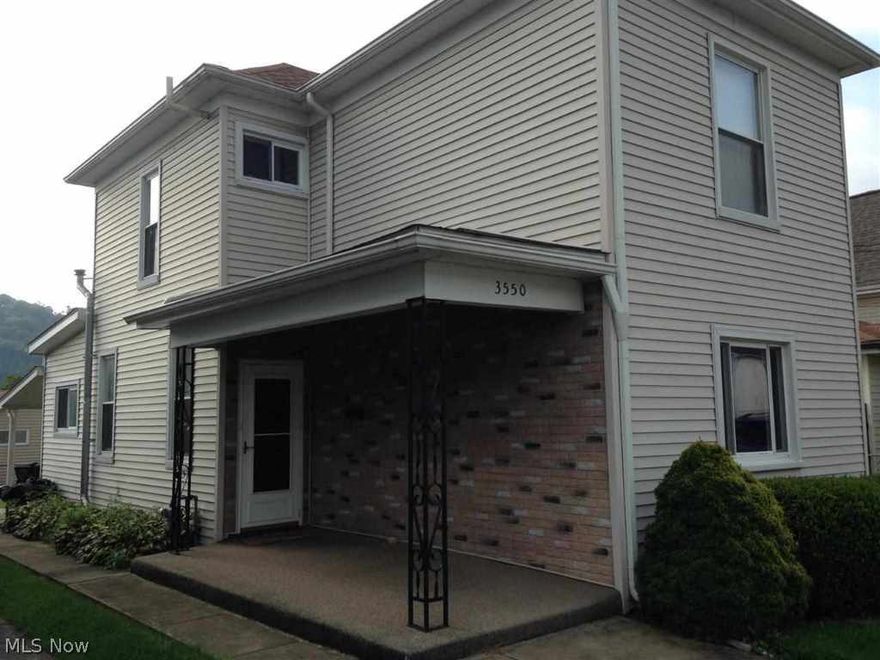 2 story vinyl house w/ 3 bedrooms (1 on main floor and 2 on the second floor), 1 1/2 baths, updated roof, windows, central air and furnace. Detached 1 car garage.