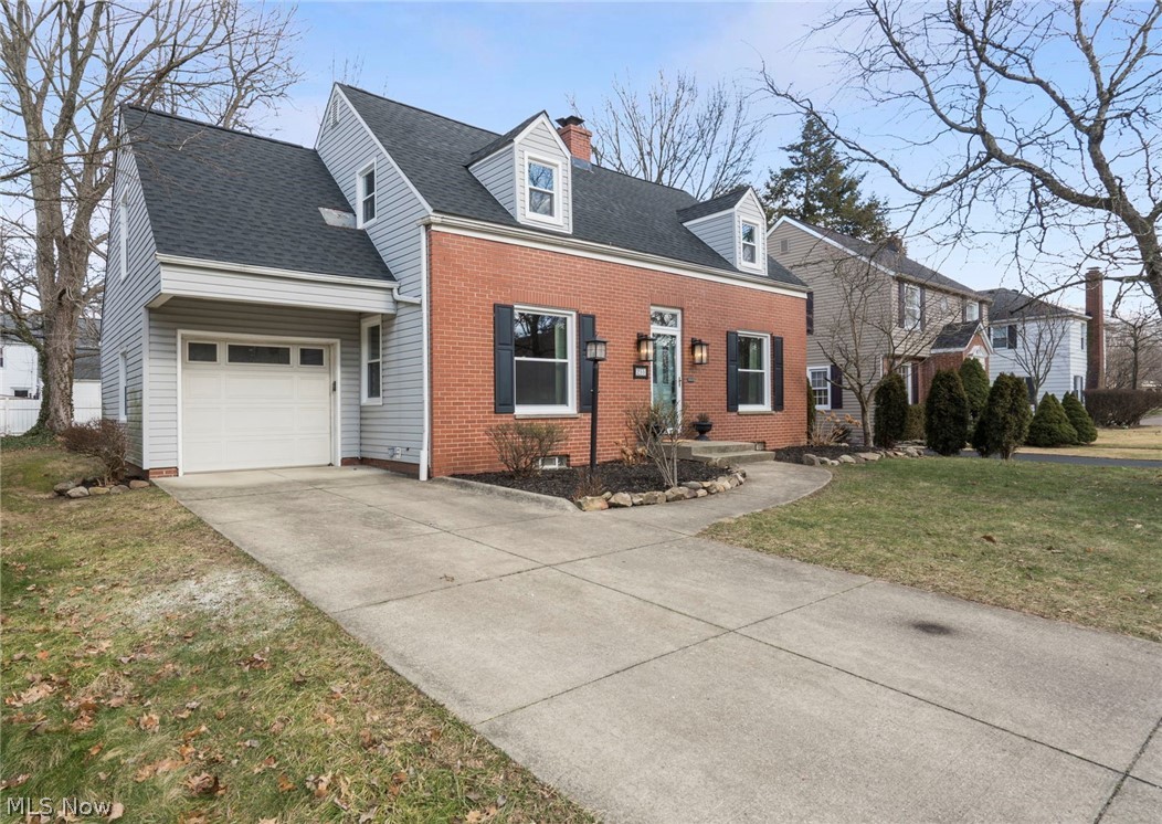 Welcome Home! Just listed is this Classic Beauty settled in a quiet neighborhood in the Heart of West Akron. As you approach, the Pristine Brick provides your first taste of this Home’s Character, the New Roof and Windows ensure Longevity and Functionality, while the Updated Front door, Landscaping, and Exterior Lighting plant the Aesthetic Cherry on Top. Through the doorway you’re greeted by the Elegance of Hardwood Flooring and Crown Molding. To your right, the Cozy Living Room, complete with a Wood Burning Fireplace for those especially chilly Northeast Ohio winter nights. To your left, the over-sized Dining Room leads you to the Kitchen. All New in the Kitchen includes Luxury Vinyl Flooring, Soft-Close Cabinetry, Stainless Steel Appliances, Sink, Faucet, Granite Countertops, AND Tile Backsplash! The Updated Half Bathroom off the Kitchen completes the first floor, but the Updates don’t stop there! Upstairs you will find more Professionally Refinished Hardwood Floors, more New Window