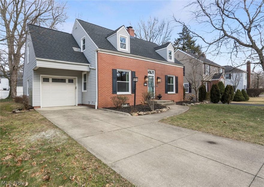 Welcome Home! Just listed is this Classic Beauty settled in a quiet neighborhood in the Heart of West Akron. As you approach, the Pristine Brick provides your first taste of this Home’s Character, the New Roof and Windows ensure Longevity and Functionality, while the Updated Front door, Landscaping, and Exterior Lighting plant the Aesthetic Cherry on Top. Through the doorway you’re greeted by the Elegance of Hardwood Flooring and Crown Molding. To your right, the Cozy Living Room, complete with a Wood Burning Fireplace for those especially chilly Northeast Ohio winter nights. To your left, the over-sized Dining Room leads you to the Kitchen. All New in the Kitchen includes Luxury Vinyl Flooring, Soft-Close Cabinetry, Stainless Steel Appliances, Sink, Faucet, Granite Countertops, AND Tile Backsplash! The Updated Half Bathroom off the Kitchen completes the first floor, but the Updates don’t stop there! Upstairs you will find more Professionally Refinished Hardwood Floors, more New Window