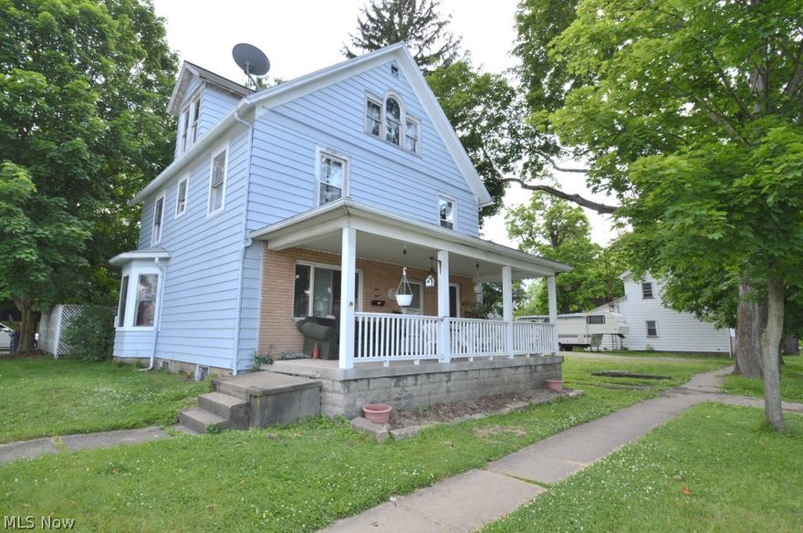 With a little TLC this 3 story colonial will make the perfect home! Nestled on a large corner lot in the middle of East Palestine, this home is close to shopping and dining. Through the front door you are greeted by a large spacious foyer and a large family room and dining room. Kitchen features tons of counter space and an eat-in dining area. The second floor is compromised of spacious bedrooms and a full bath. The third floor features a fourth bedroom. The possibilities are endless!