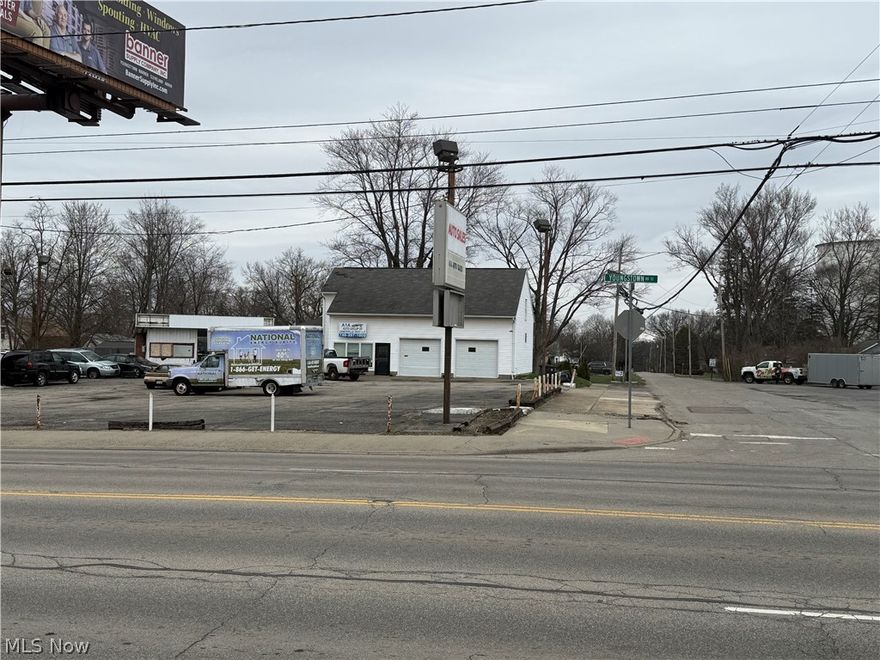 Commercial opportunity on this corner property. High traffic, high visibility. First floor reception/office area, garage/workshop area with 10' doors. Second floor is open space that can be used offices, storage.