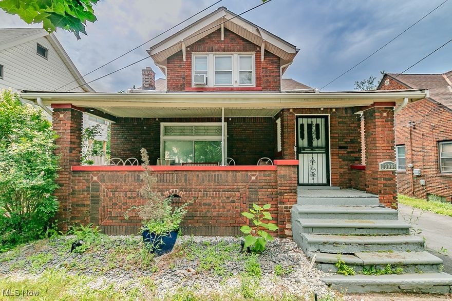 She is Big, Brick, and Beautiful ~ sitting pretty in the heart of the Union-Miles Park neighborhood. You can feel the love and care this home has received over the past 50 years ~ and now it is your turn to fall in love. Step onto the welcoming front porch and into a spacious living room with a charming decorative fireplace that flows seamlessly into the formal dining room. Take in the old-world craftsmanship ~ the built-in cabinets, moldings, and woodwork are simply timeless. The kitchen offers plenty of space for everything you need (and then some!). Two bedrooms and a full bath complete the first floor. Upstairs, you will find three more bedrooms ~ including bedrooms 4 and 5, each with impressive walk-in closets. The expansive basement provides tons of storage or the perfect canvas for a rec room, workshop, or whatever your heart desires. Out back, enjoy a private yard, a deck for relaxing, and a two-car detached garage. This is the one you've been waiting for!  Roof 6 years, Furnace 8 years, new stove & refrigerator, hot water tank 6 months.