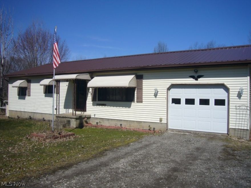 Built in 1991 this 2-3 bedroom, 2 bath ranch is simply the right size country home on 1.7 acres!    *  Offers a 1-car attached garage plus a 24 x 32 outbuilding for many uses  *  Great open floor plan kitchen with abundant cupboards and counter work space  *    Easy-access slides onto windowed sunroom with door to 16 x 8 wood deck to overlook and enjoy outdoor nature all year round   *   Laundry located on 1st floor  *  Two full baths on main floor; one private in master bedroom  *  Clean steam heat, nice white tile, 2 year old steel roof on home, nice storage throughout, 200 amp electric, hunter fans in each room  *  Walkout basement was built 12-block high offers 3rd bedroom option, large recreation room, and two additional storage rooms  *  Additional storage shed 12 x 12  *  Pines line property line, small stream runs on one side makes this great for gardening, playing or comfortable living *  Located near 224, 44 & 76 *  Much to offer - Call today!