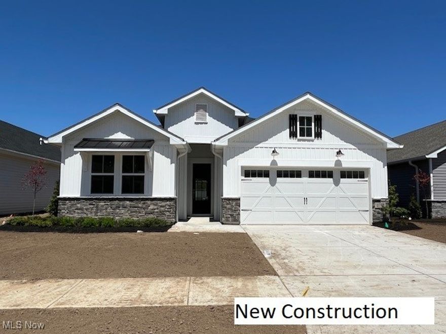 QUICK MOVE IN - Poitier floor plan featuring a multigenerational "classic look" interior finish palette and an open concept floor plan! Come inside through the welcoming foyer with 12 foot tray ceiling, you will be impressed by the design, it reflects the way people want to live today! Beautiful kitchen, including large center island with pendant lighting overhead, space for barstools and casual dining. Aristokraft cabinets, with quartz countertops and GE stainless steel appliances dresses up this kitchen. Dining adjacent to the kitchen, windows surround this room. This home has an office/study. The great room ceiling is vaulted, fireplace and exits to a beautiful covered patio. Luxury vinyl plank, neutral colored flooring throughout the first floor, carpet in all bedrooms. The laundry room is conveniently located off of the foyer hallway with a utility tub/sink. Rest easy and luxury and owner suite which includes luxurious bathroom, ceramic tile and large walk-in closet. Note 9 foot ceilings standard. Landscaping package is as follows: Sod in front yard, seed and backyard, front bed includes enhanced plantings across the front elevation. Irrigation system is included as well. Extensive home warranties included. Clubhouse, pool, Pickleball, billiard room, yoga, studio, gym, entertaining area, and activities coordinator. Estimated occupancy for April 2025.